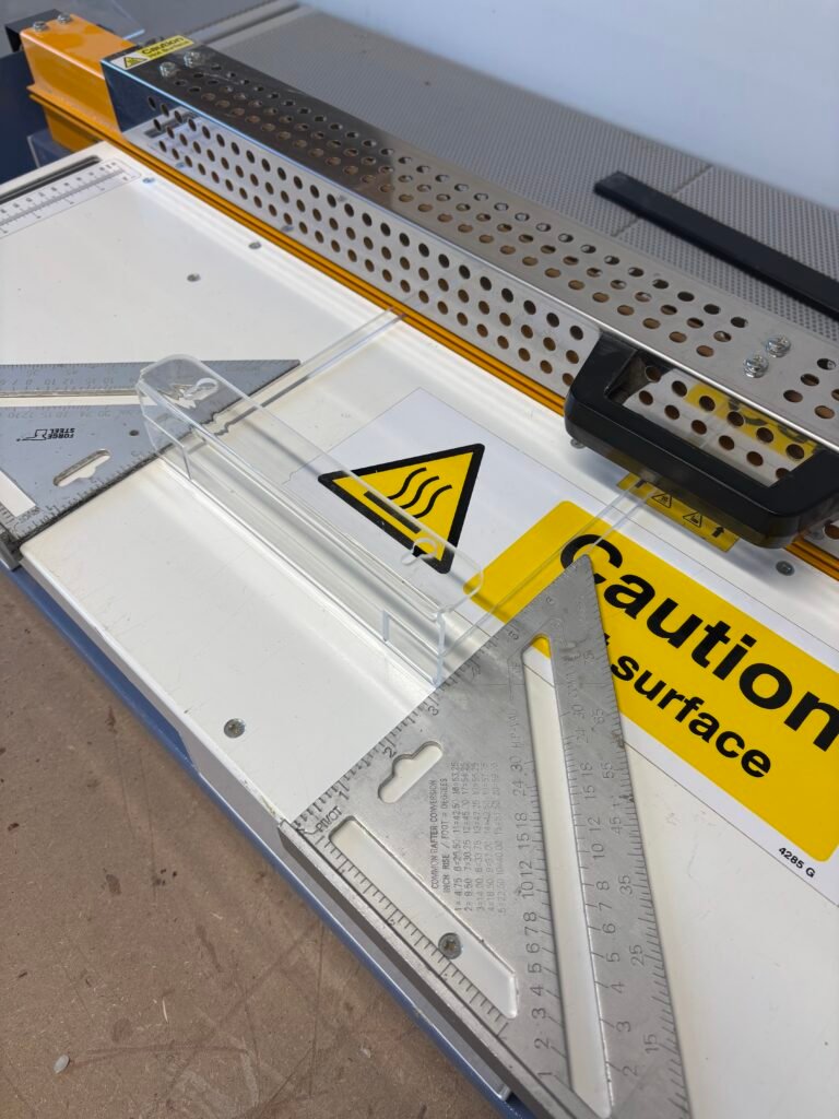 the heat bender in use, heating up some perspex